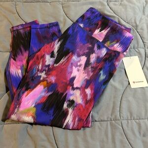 Lululemon Purple and Pink Wunder Train Leggings